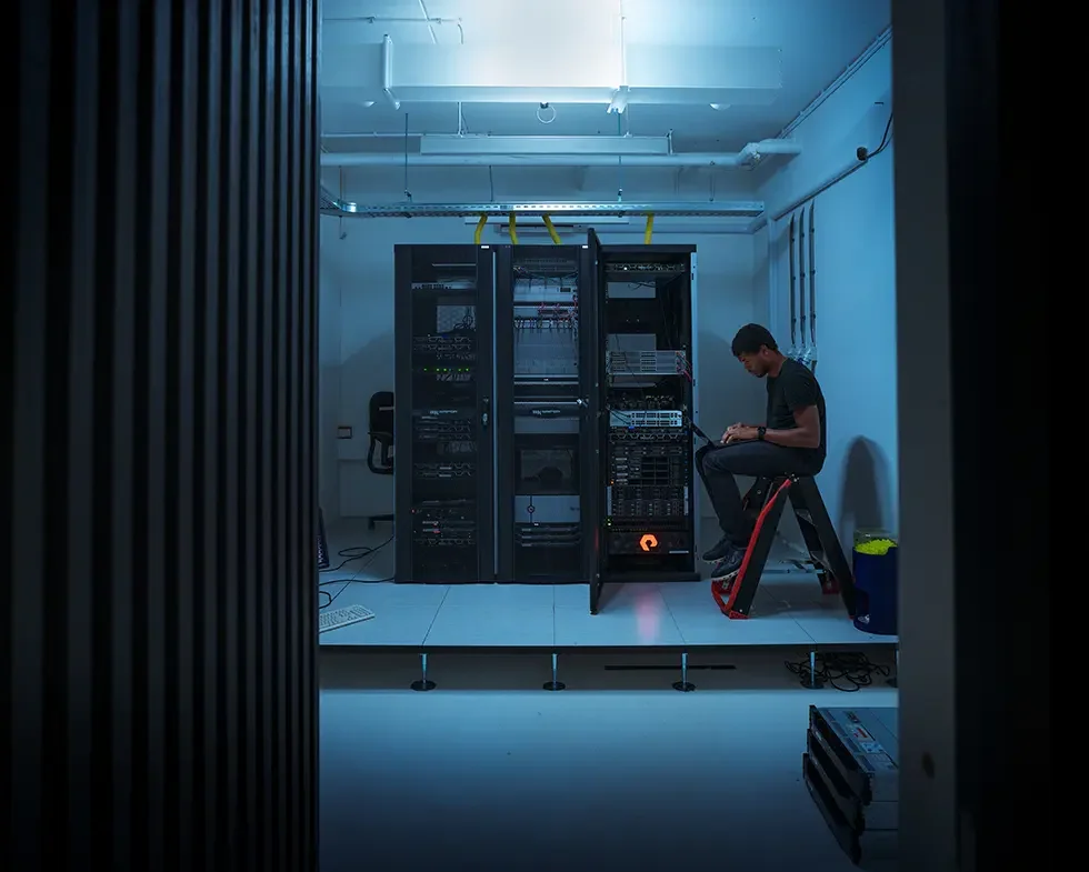 Colleague working in server space